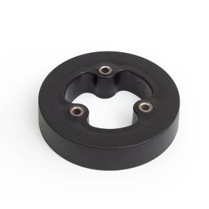 Steering wheel spacer for heavy equipment